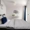 Coco Chanel Boutique Apartment by goodnite cz