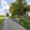 Spacious Holiday Home with Pond in Poperinge