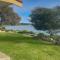 Sunset Ridge Has Direct Access To A Private Beach and Small Jetty