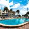 Prime Location 2 Story Condo with WiFi, Shared Pool, Ocean Views, & Beach Access