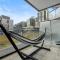 Luxury Waterfront Suite with City Views and AC