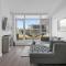Luxury Waterfront Suite with City Views and AC