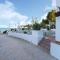 Comfort Steps from the Sea