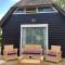 Oasis holiday home in Giethoorn next to canal, boat extra