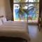 Jacaranda House