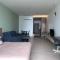 Beachfront Retreats @RoxyBeachSematanApt.