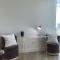 Luxury Designer Suite with Rooftop Pool, Gym