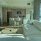 Luxury Designer Suite with Rooftop Pool, Gym