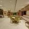 Qotel Hotel AT Residency Kaushambi Anand Vihar