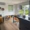 Chalet by Water in Idskenhuizen Recreation Park