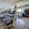 Riverside Retreat - Enjoy Walking Trails, FREE Banff Pass, Gym, Wine & Parking! Work Space Included!