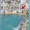 Apartamento vista do mar, pé na areia e águas tranquilas, no cento de Guarapari