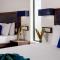 The Blue Wave Hotel