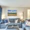 Elevated Fraser Condo with Mountain View and Amenities