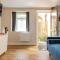 The Scullery - a quirky annex with wood fire