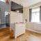 The Scullery - a quirky annex with wood fire