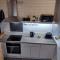 The Scullery - a quirky annex with wood fire