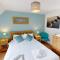 Daisy Cottage - Part of the The Bay Filey Holiday Village with pool, gym and direct beach access, pub, restaurant, tennis and meadows walks