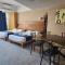 Suites Omega Torres Gemelas