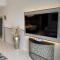 GRANDE RESIDENCES with a direct Burj Khalifa view and Private Fountain Show at 42nd floor with DXB AIRPORT VIP Shuttle