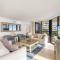 Stylish beachfront condo with spa/pool and ocean views