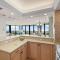 Stylish beachfront condo with spa/pool and ocean views