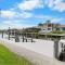 Quiet waterfront home with pool, dock and bicycles