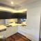 Swanky 2 bed apt with parking - easy city access