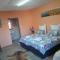 Farmhouse Boutique Backyard Rooms