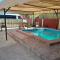 Farmhouse Boutique Backyard Rooms