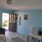 Farmhouse Boutique Backyard Rooms