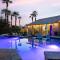Luxury Oasis w Pool Hot Tub Fire Pit Games Big Yard Larrea by AvantStay