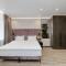 Status Apartments