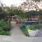 Farmhouse Boutique Backyard Rooms