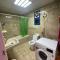 Room attached bathroom with tv