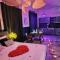 Suite Passion - Jacuzzi privé - Table massage