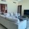 2BR Beachfront Apartment with Ocean Views