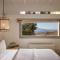 Villa Amra - Secluded Mykonos Haven with Sea Views, Heated Pool, Gym & Hammam