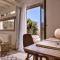 Villa Amra - Secluded Mykonos Haven with Sea Views, Heated Pool, Gym & Hammam