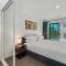 Spacious 4-Bed Home with Coastal Charm