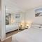 Spacious 4-Bed Home with Coastal Charm