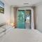 Spacious 4-Bed Home with Coastal Charm