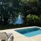Ti Bwa Lodge, bas de villa cosy, piscine & vue mer