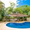 Cozy Ground-Floor Condo with Community Pool, Rancho and Lush Garden Views