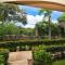 Cozy Ground-Floor Condo with Community Pool, Rancho and Lush Garden Views