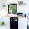 White Jacaranda Tiny House by Tiny Away