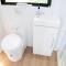 White Jacaranda Tiny House by Tiny Away