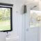 White Jacaranda Tiny House by Tiny Away