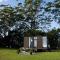 White Jacaranda Tiny House by Tiny Away