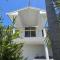 Summer Days - elevated home with ocean views